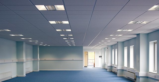 Auditorium with advanced acoustic ceiling panels and lighting